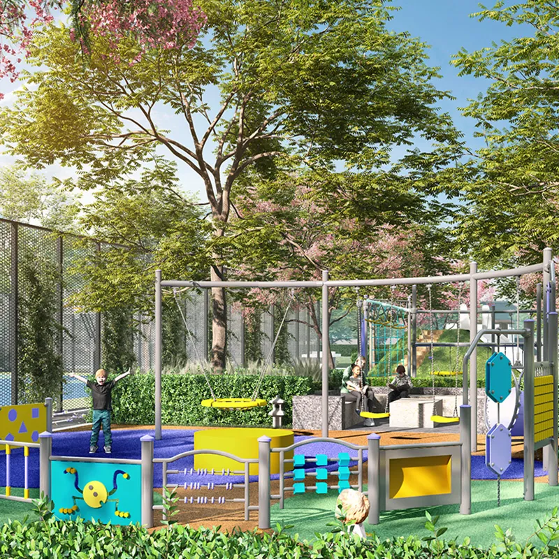 A colourful children’s play area under trees, at Manyata Ekamara